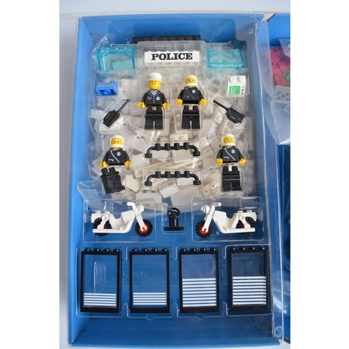 1402 - Two C1980's boxed Lego sets to include 6386 Police station (1986, box complete with inner clear plas... 