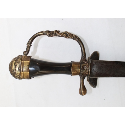 253 - Mid C18 German hunting sword, lacking scabbard. The Brass pommel, hand guard, and cross guard are em... 