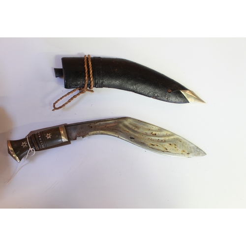 333 - Vintage horn-handled Kukri complete with original steel mounted leather sheath and with original Cha... 