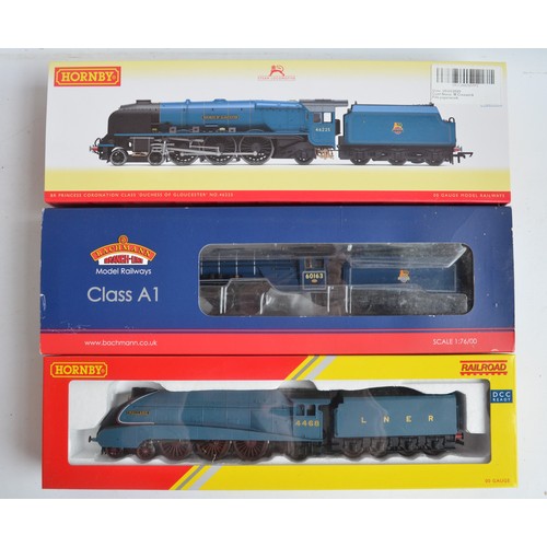 1074 - Three boxed OO gauge electric steam train models to include Hornby R3371 LNER Class A4 'Mallard' (pl... 