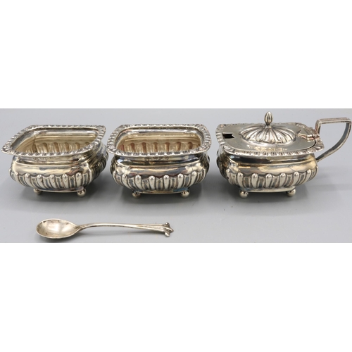 139 - Victorian silver pair of salts and a mustard stood on four ball feet, part lobed bodies and gadroone... 