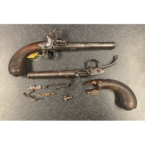 104 - Pair of late 18th century Queen Anne 18 bore flintlock pistols, 6.5