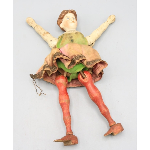 771 - Schoenhut Humpty Dumpty Circus female acrobat, with wooden legs, body and arms and a painted ceramic... 