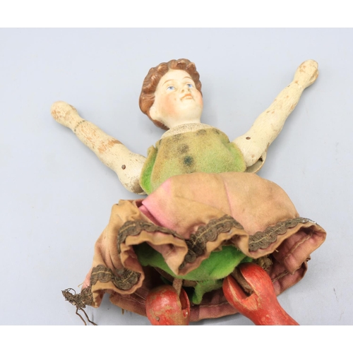 771 - Schoenhut Humpty Dumpty Circus female acrobat, with wooden legs, body and arms and a painted ceramic... 