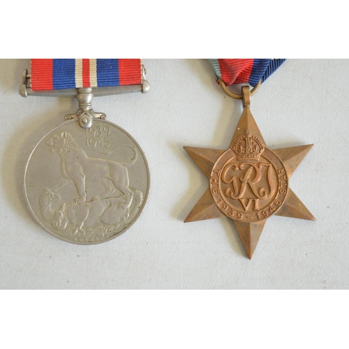 715A - World War II 1939-45 war medal and 1939-45 Star (no inscriptions) and 2 commemorative coins