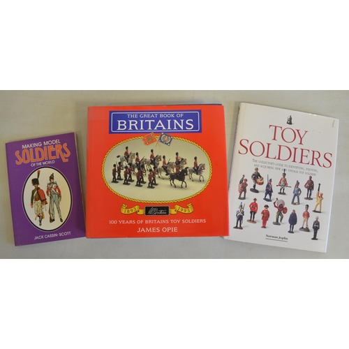 717 - Three books concerning model soldiers to include The Great Book Of Britain's 1893-1993 by James Opie... 