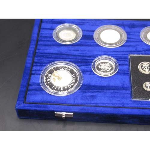 281 - Royal Mint - The United Kingdom Millennium Silver Collection No.09279, comprising five pound coin, t... 