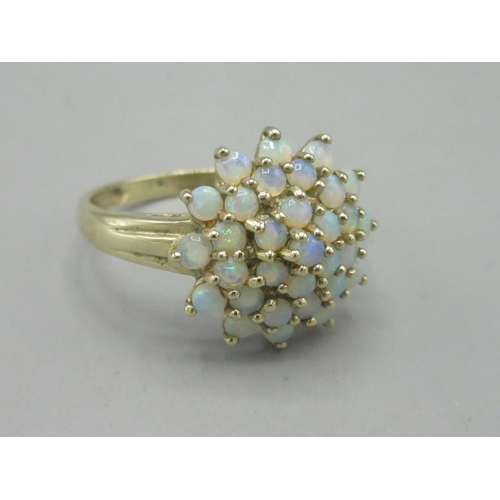 37 - 9ct yellow gold opal cluster ring, size V, stamped 375, 3.77g