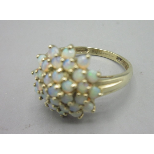 37 - 9ct yellow gold opal cluster ring, size V, stamped 375, 3.77g