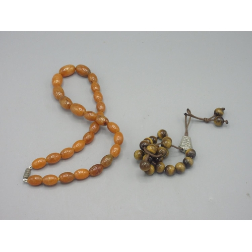 38 - Amber bead necklace with screw closure, and aa tigers eye bead necklace with white metal closure