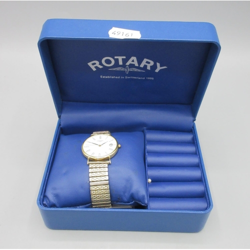 1200 - Rotary 18ct gold quartz dress wristwatch with date on gold plated expanding bracelet, signed white R... 