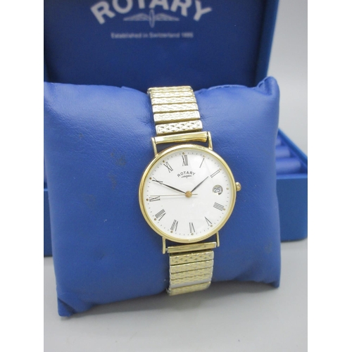 1200 - Rotary 18ct gold quartz dress wristwatch with date on gold plated expanding bracelet, signed white R... 