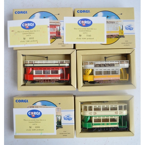 564 - Thirty two diecast bus and tram models from Corgi, Dinky and The Open Top Bus Company, models all ch... 