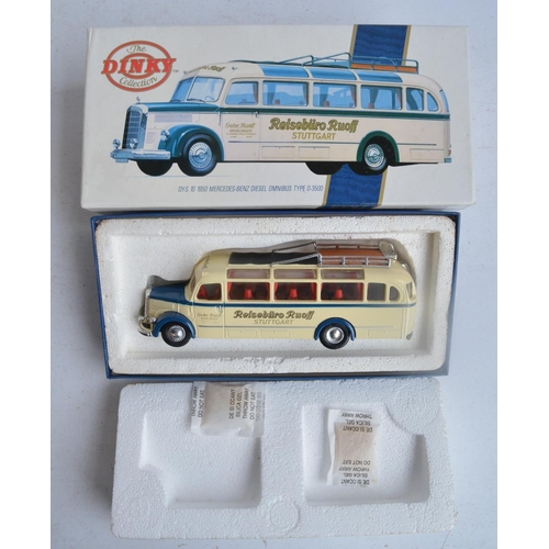 564 - Thirty two diecast bus and tram models from Corgi, Dinky and The Open Top Bus Company, models all ch... 