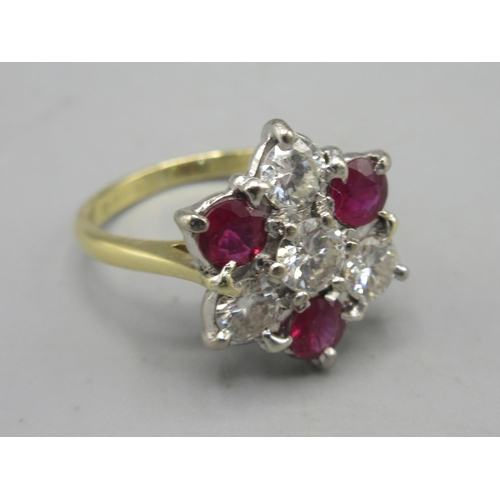 1 - 18ct yellow gold diamond and ruby cluster ring set with four diamonds and three rubies, size I1/2, s... 