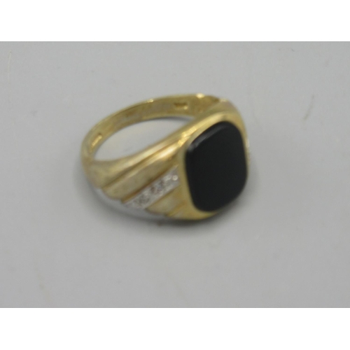 28 - 9ct yellow gold signet ring set with onyx face and diamond chips, stamped 375, size Q, 5.75g