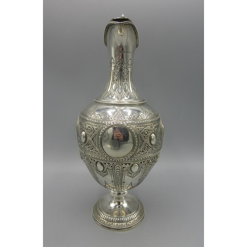 247 - Victorian silver claret jug of baluster form, vacant cartouche, panels of engraved geometric detaili... 