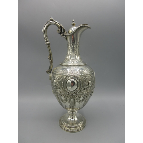 247 - Victorian silver claret jug of baluster form, vacant cartouche, panels of engraved geometric detaili... 