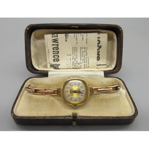 313 - Swiss lady's 9ct gold wristwatch on integrated rolled gold expanding bracelet, gold coloured dial wi... 