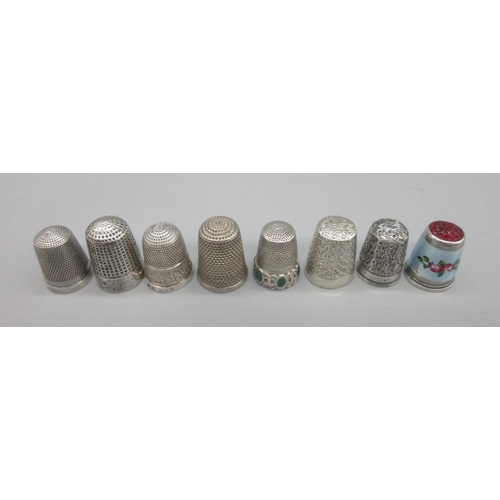 43 - Eight silver thimbles, all with different decoration including one with rose guilloche enamel and re... 