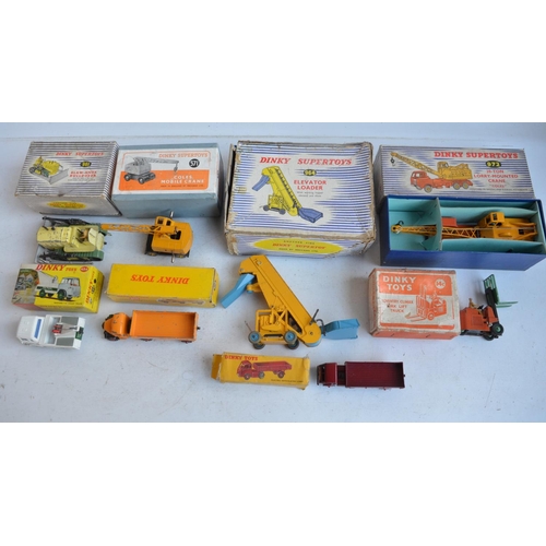 574 - Nine boxed vintage Dinky diecast vehicles with original boxes, model and box condition generally poo... 