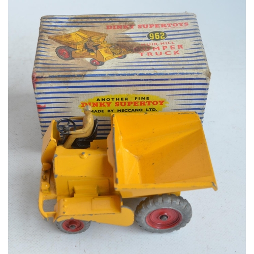 574 - Nine boxed vintage Dinky diecast vehicles with original boxes, model and box condition generally poo... 