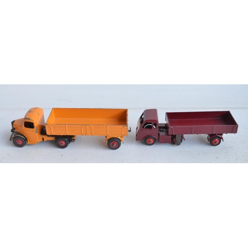 574 - Nine boxed vintage Dinky diecast vehicles with original boxes, model and box condition generally poo... 