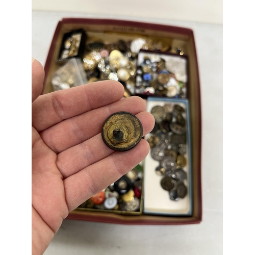 262 - Large collection of 19th century and later buttons in glass metal and plastic, incl. an unmarked Bim... 