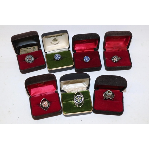 272 - Seven Scottish hallmarked silver millefiori glass rings by Caithness Jewellery, each with a millefio... 