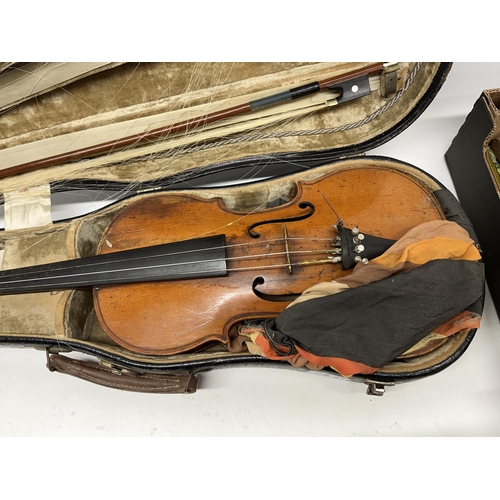 781 - Collection of musical instruments, incl. two early 20th century violins, a Suzuki mandolin, harmonic... 