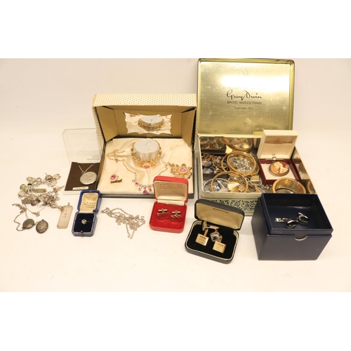 141 - Collection of silver jewellery including three locket necklaces, charm bracelet, silver ingot, and a... 