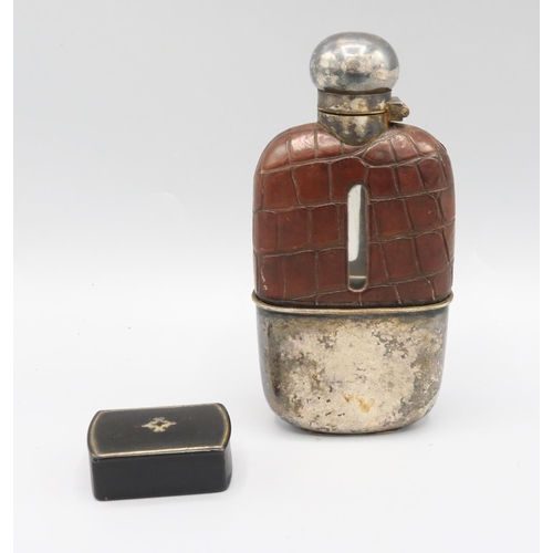 94 - Glass and crocodile skin hip flask with silver plated twist lock hinged cap and removable stirrup cu... 