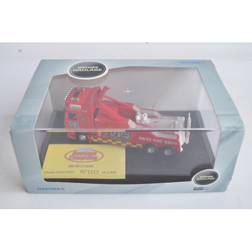 590 - Fifteen boxed 1/76 scale (OO gauge) diecast truck models from Oxford Haulage range, some models a li... 