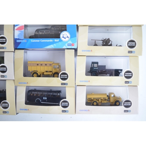 597 - Twenty five boxed 1/76 scale (OO gauge) diecast Military vehicle models from Oxford Diecast, model c... 