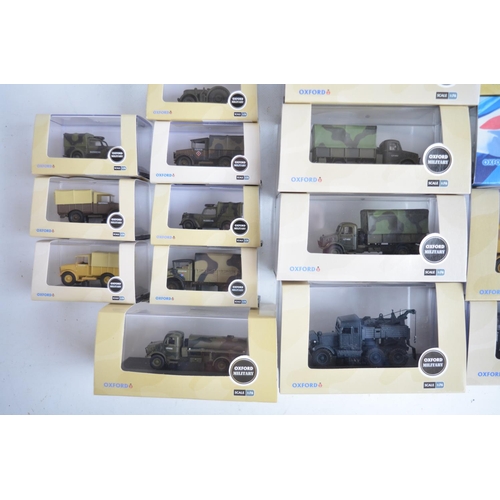 597 - Twenty five boxed 1/76 scale (OO gauge) diecast Military vehicle models from Oxford Diecast, model c... 