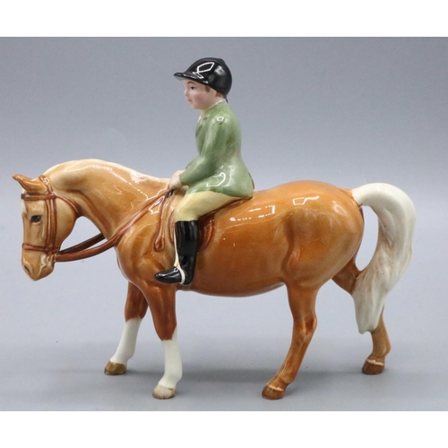 776 - Beswick boy on palimono pony, H15cm