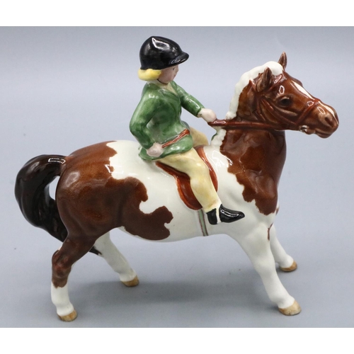 777 - Beswick girl on skewbald pony, H14.5cm