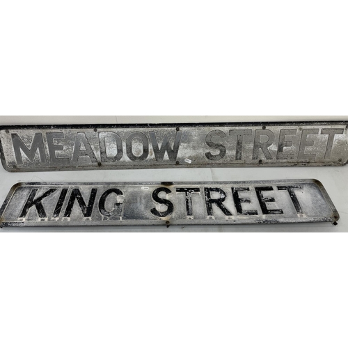 645 - Two pressed aluminium alloy signs 'King Street' and 'Meadow Street' maximum W114.5cm