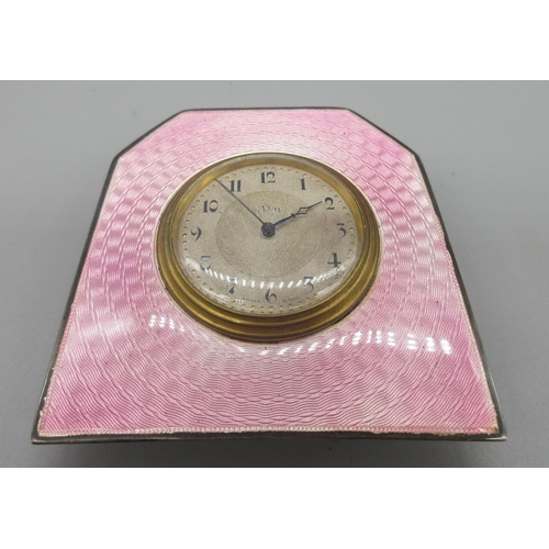 1193 - Art Deco silver and pink guilloche enamel 8 day bedside strut timepiece, silvered engine turned Arab... 