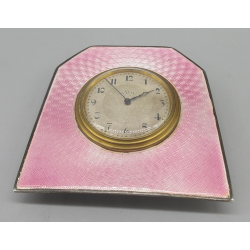 1193 - Art Deco silver and pink guilloche enamel 8 day bedside strut timepiece, silvered engine turned Arab... 