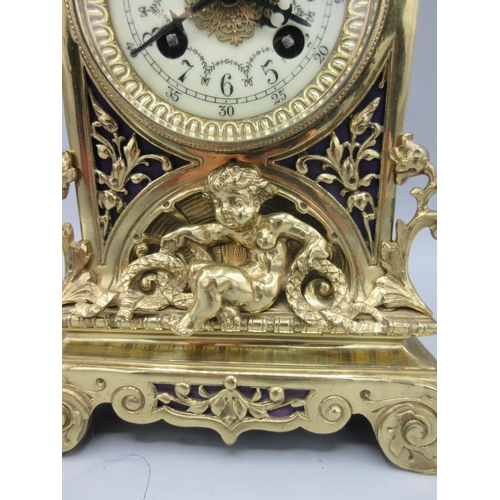 217 - Vincenti, French brass mantle clock, cast brass case, pierced fabric backed sound frets, 3