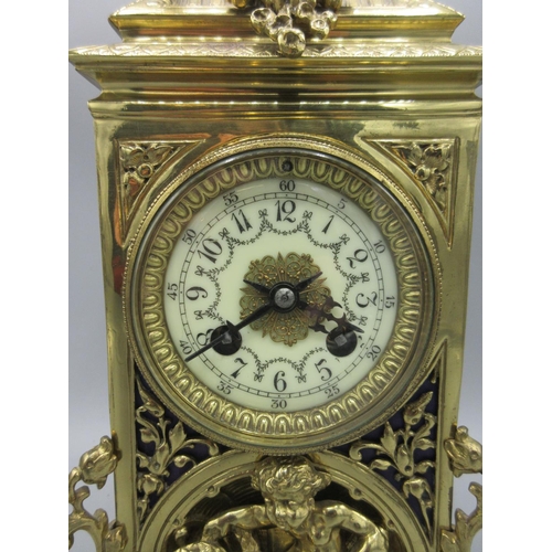 217 - Vincenti, French brass mantle clock, cast brass case, pierced fabric backed sound frets, 3