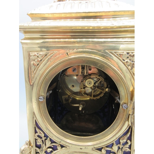 217 - Vincenti, French brass mantle clock, cast brass case, pierced fabric backed sound frets, 3