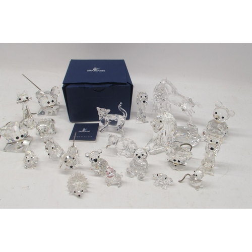 231 - Collection of Swarovski animals, incl. a boxed cat; foals; lion; etc. max H10cm (20)