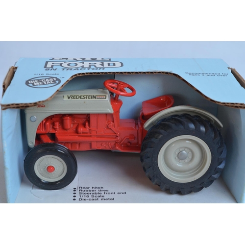 598A - Four boxed 1/16 scale diecast metal tractor models from Ertl to include Massey Harris 55, McCormick ... 