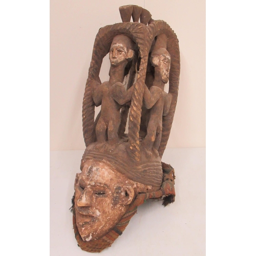 652 - Nigerian carved and painted softwood ceremonial spirit mask - headdress, possibly Igbo, H62cm