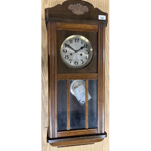 1184 - 20th Century beech wall clock, full length glazed panelled door enclosing, 6 1/4