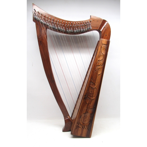 238 - Twenty-two string harp, with carved decoration, H87.5cm