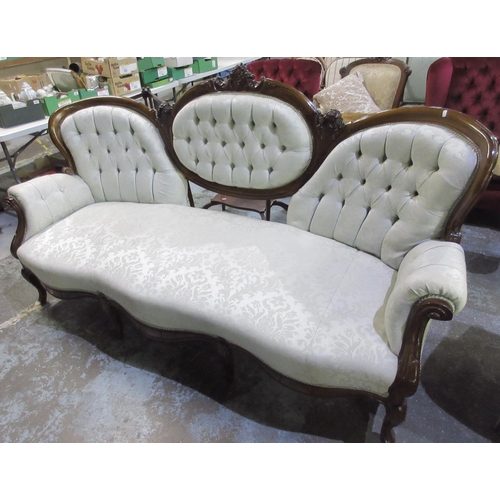 131 - Victorian carved walnut framed salon sofa, buttoned back and arms with serpentine front on cabriole ... 