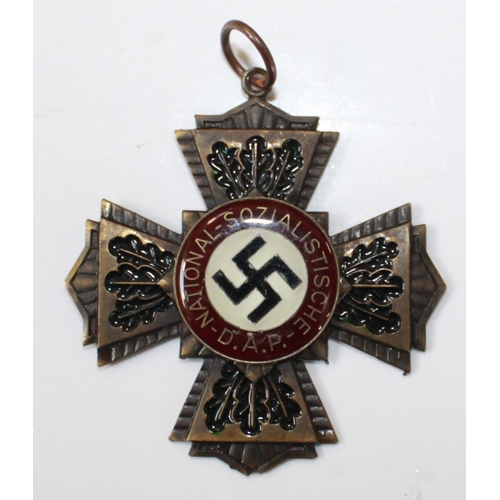 246 - WWII German Order of the Dead Cross. Central party badge and Oak leaf design. (replacement suspensio... 